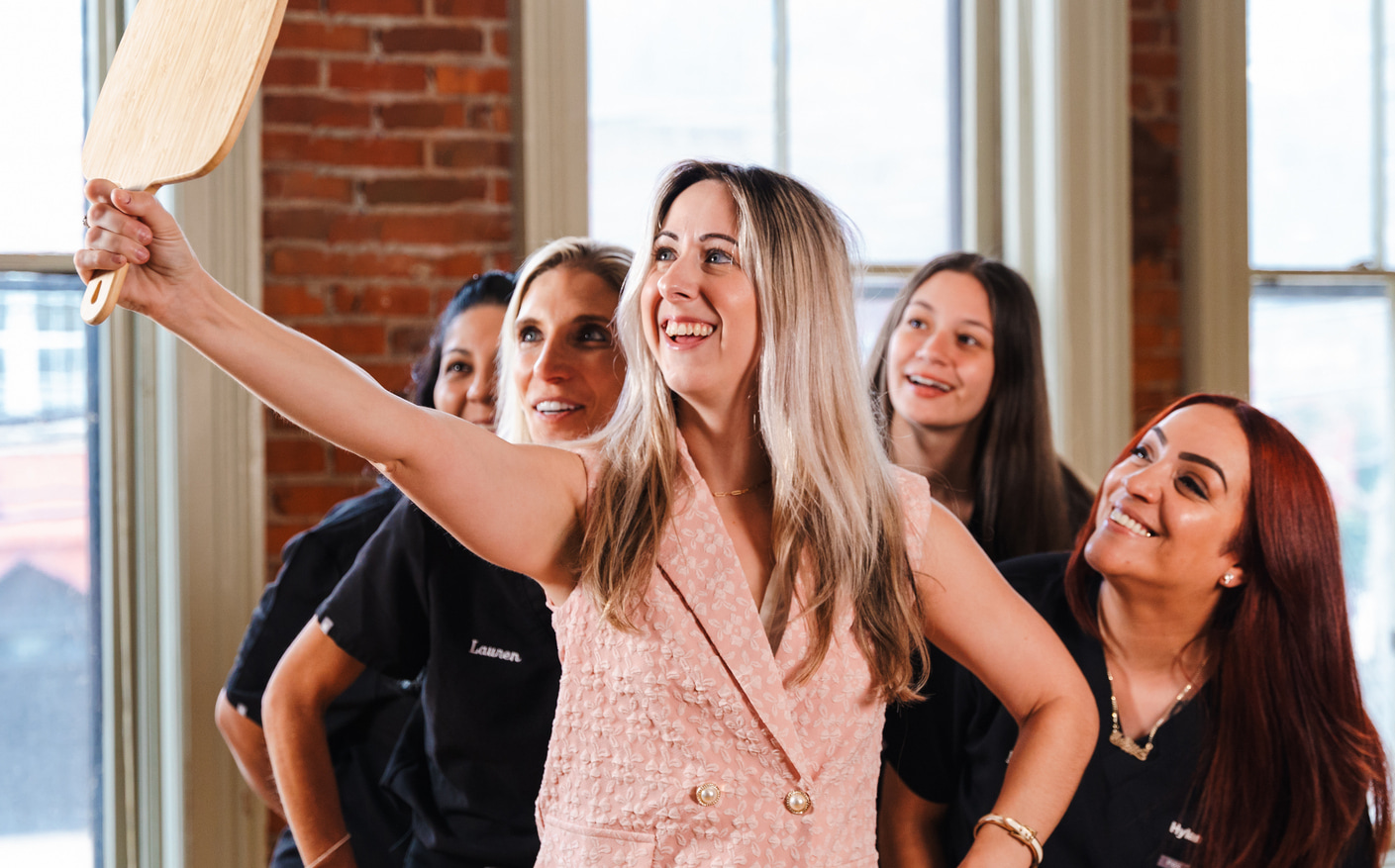Hylan Dental Care Team Capturing a Memorable Selfie with a Beloved Client