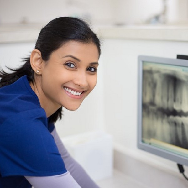 Dentist performing x-ray