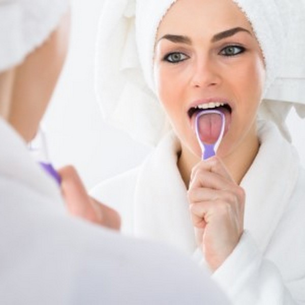 Is Tongue-Scraping Worthwhile? Ask Our Dentist
